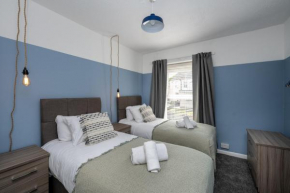 Stay at the Marine House - TV in every bedroom!